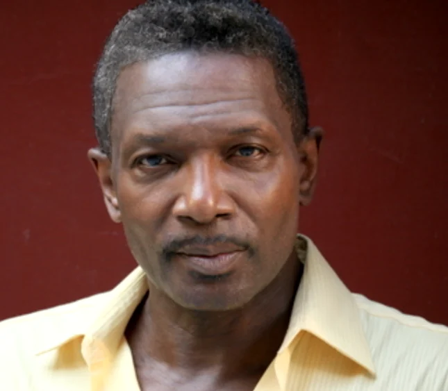 Sedly Bloomfield contemporary yellow shirt headshot